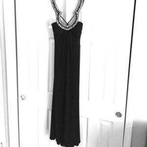 Gorgeous black evening gown with stunning neckline