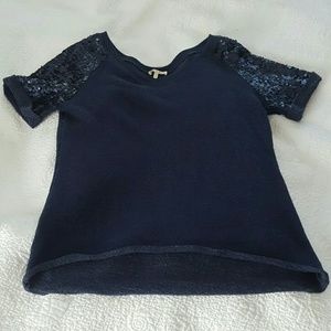 Navy blue top with sparkly sleeves