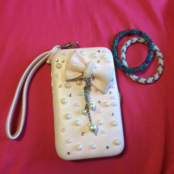 Pink and pearled Wristlet