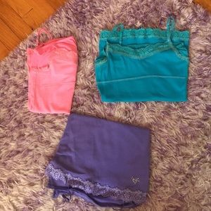 Three tank tops from justice, selling $9 for all 3