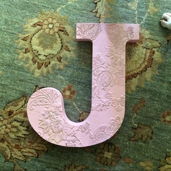 Light pink J with paisley detailing