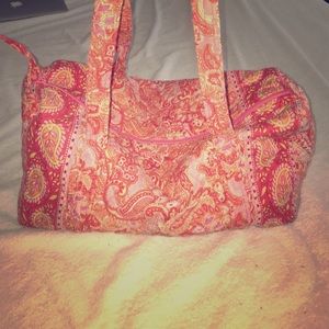 Orange and pink Vera Bradley travel bag