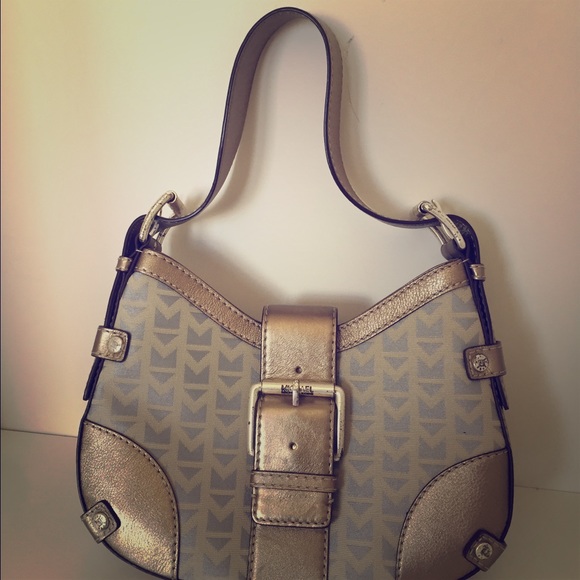 Like new Michael Kors logo bag, gold leather trim