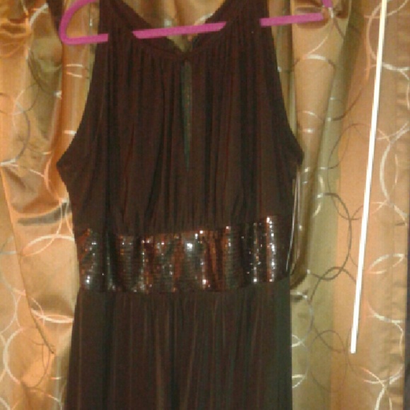 Flowing sequined black dress