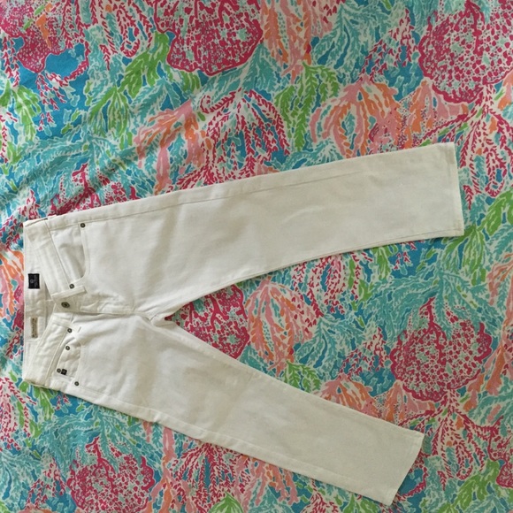 A pair of white relaxed straight crop jeans