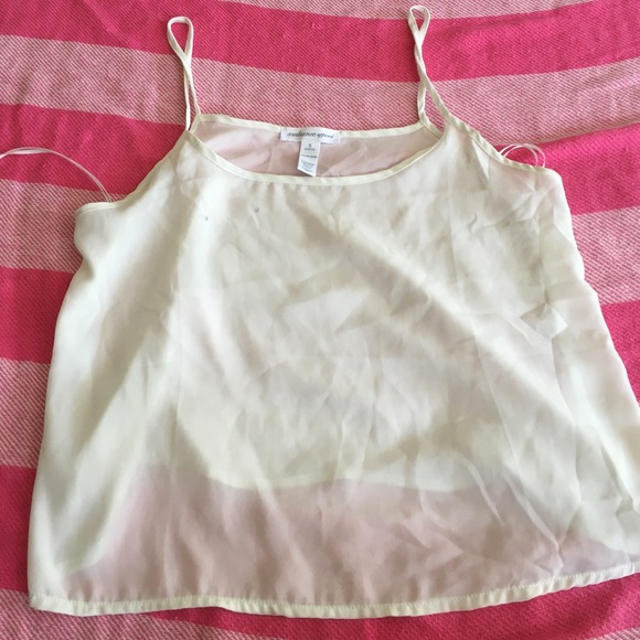 White polyester shirt.