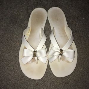white flip flops with rhinestone bows