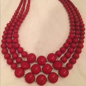 Red statement necklace