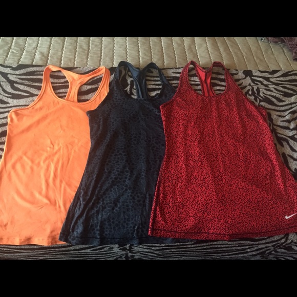 Nike tank tops in medium sold separately or bundle