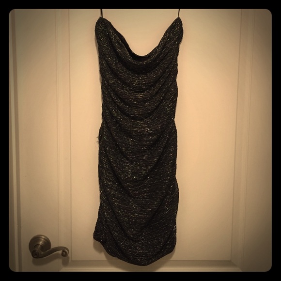 Black and silver strapless dress.