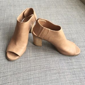 Open toed cream heels