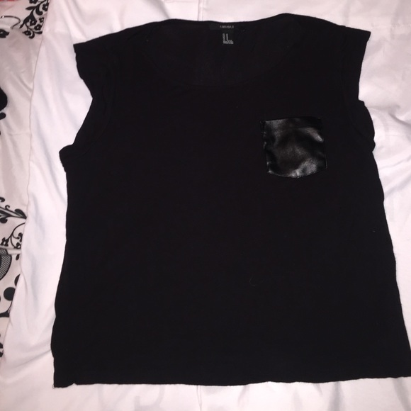 Black top with faux leather pocket
