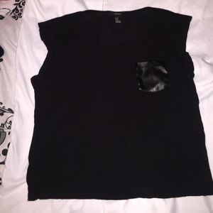 Black top with faux leather pocket