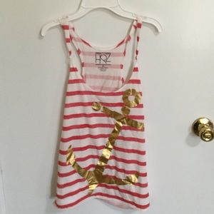 White, pink, and gold tank