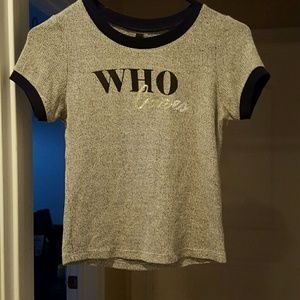 Grey shirt that says "who cares"