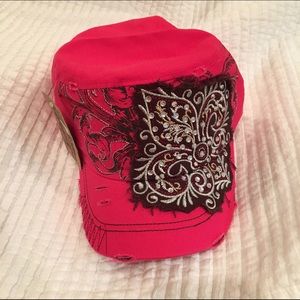 Dark pink hat with embellishments