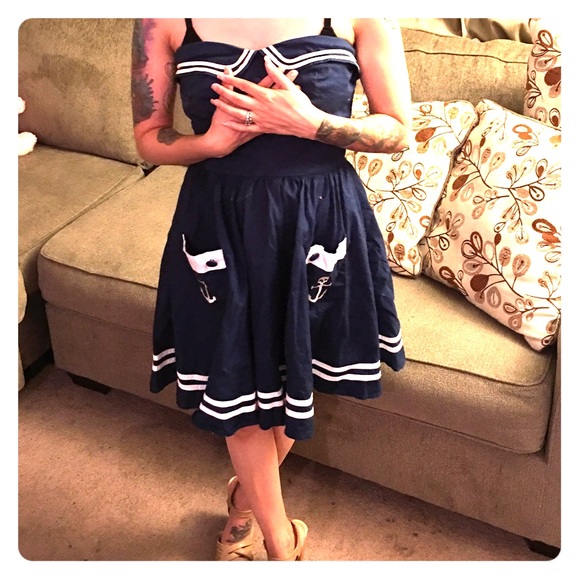 A vintage style dark blue dress