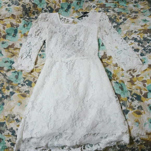 White lace dress with open back