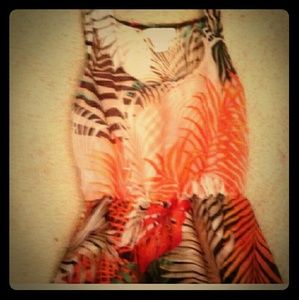 Sleeveless, sheer baby doll top.