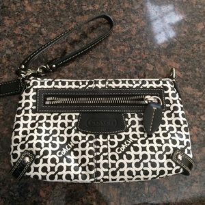 Large black and white Coach wristlet