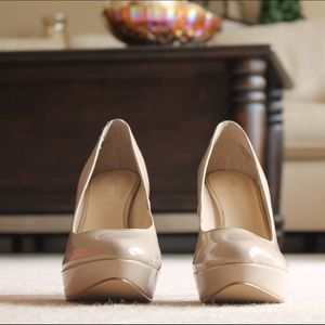 Nine West Nude Patent Pumps
