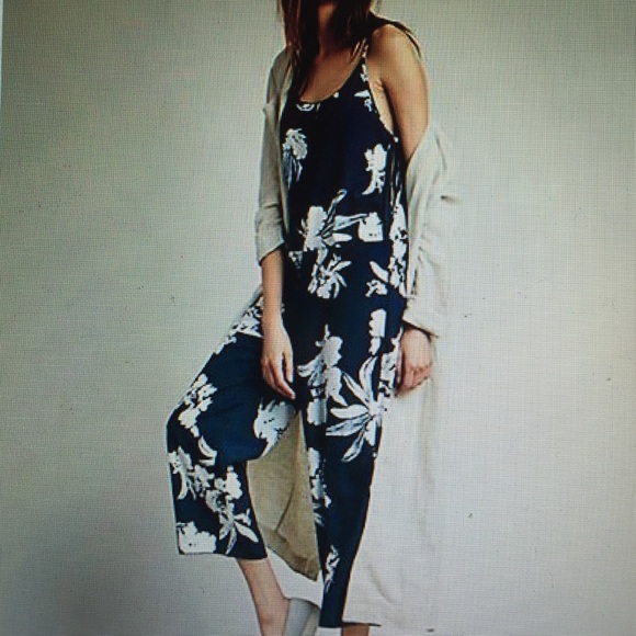 Free people staring at sunsets romper