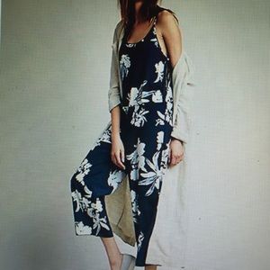 Free people staring at sunsets romper