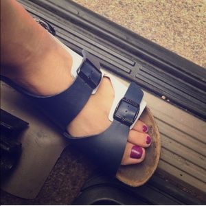 Blue and white Birkenstocks