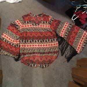 Tasseled, artsy-hippy long bell sleeve