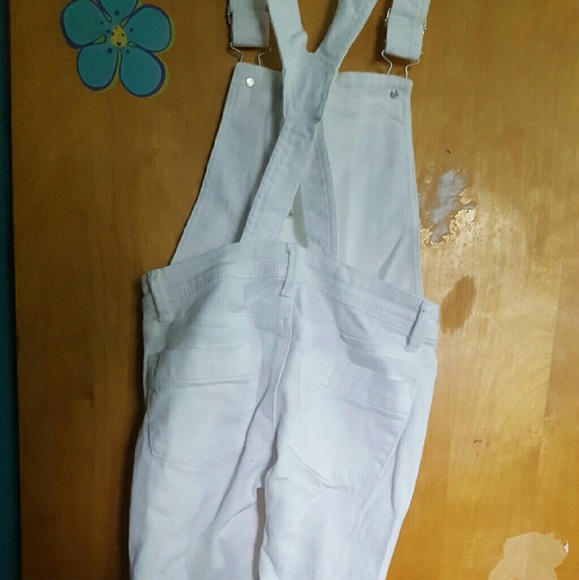 White ripped overalls
