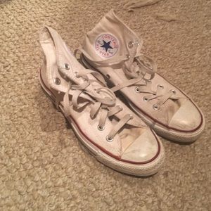 White high top converse.