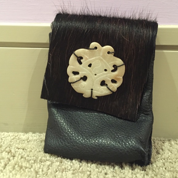 A fur hand clutch/wallet