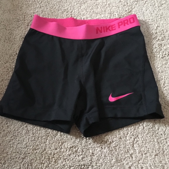 Black and pink nike pros