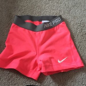 Light pink nike pros