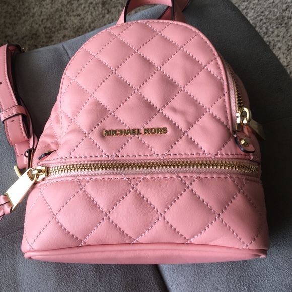 Michael Kors Handbags - Mini backpack or crossbody