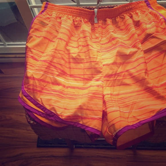 Orange and purple and white shorts Dri fit