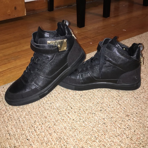 All black high top shoes