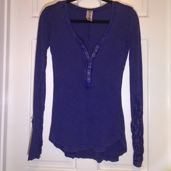 Navy blue, long sleeved top with lace and sequins
