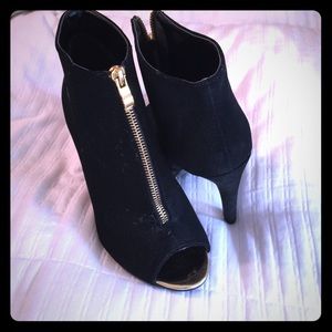 Peek-toe zip up heels