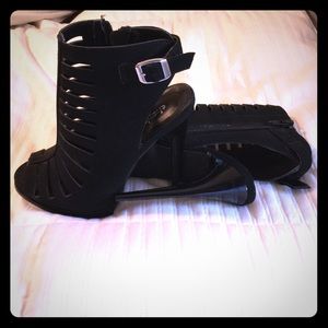Black suede heeled peek-toe boot