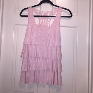 Light pink, poly spandex ruffled top with lace