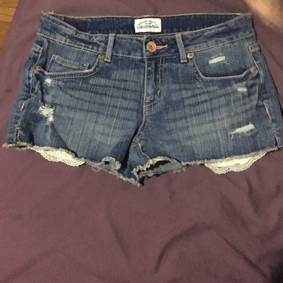 Shorts with lace under pockets