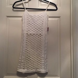 White spandex, holey tank top