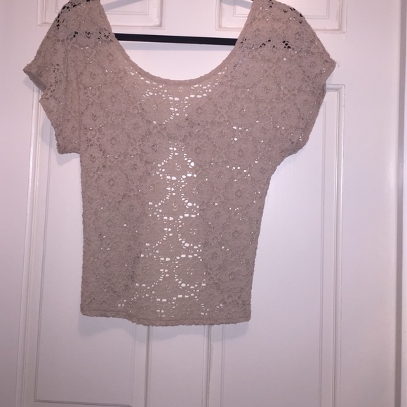 Beige lace blouse with open back