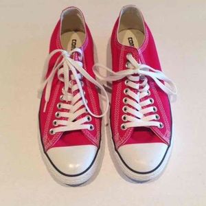 Red converse all star sneakers.