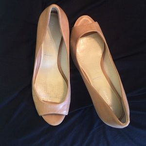 Nude peep toe pumps