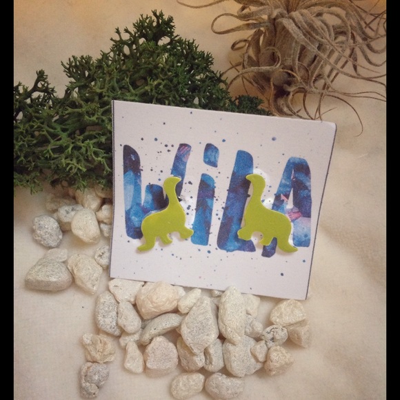 Adorable green dinosaur earrings