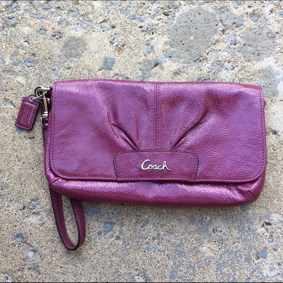 Shiny Leather COACH wristlet.