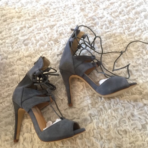 Gray faux suede lace up heels.
