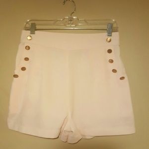 Pink high waisted button shorts
